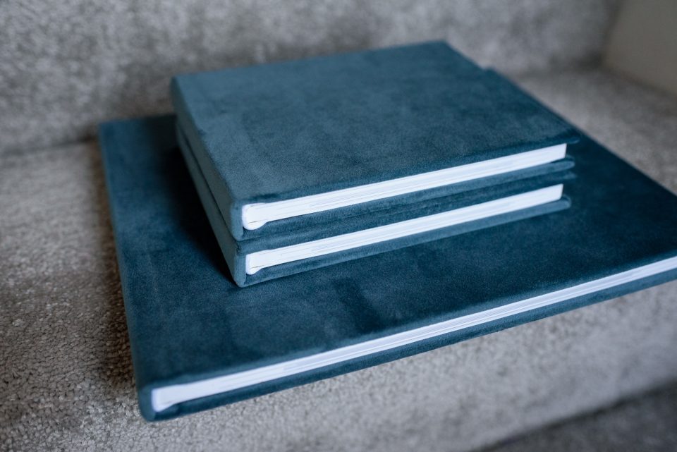 Photobooks of printed documentary family photographs taken by Johanna King Photography including two mini duplicates