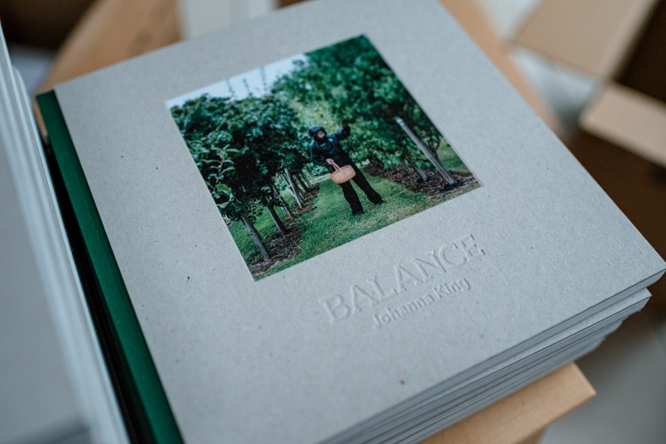 Photo book titled 'BALANCE' by Johanna King on display